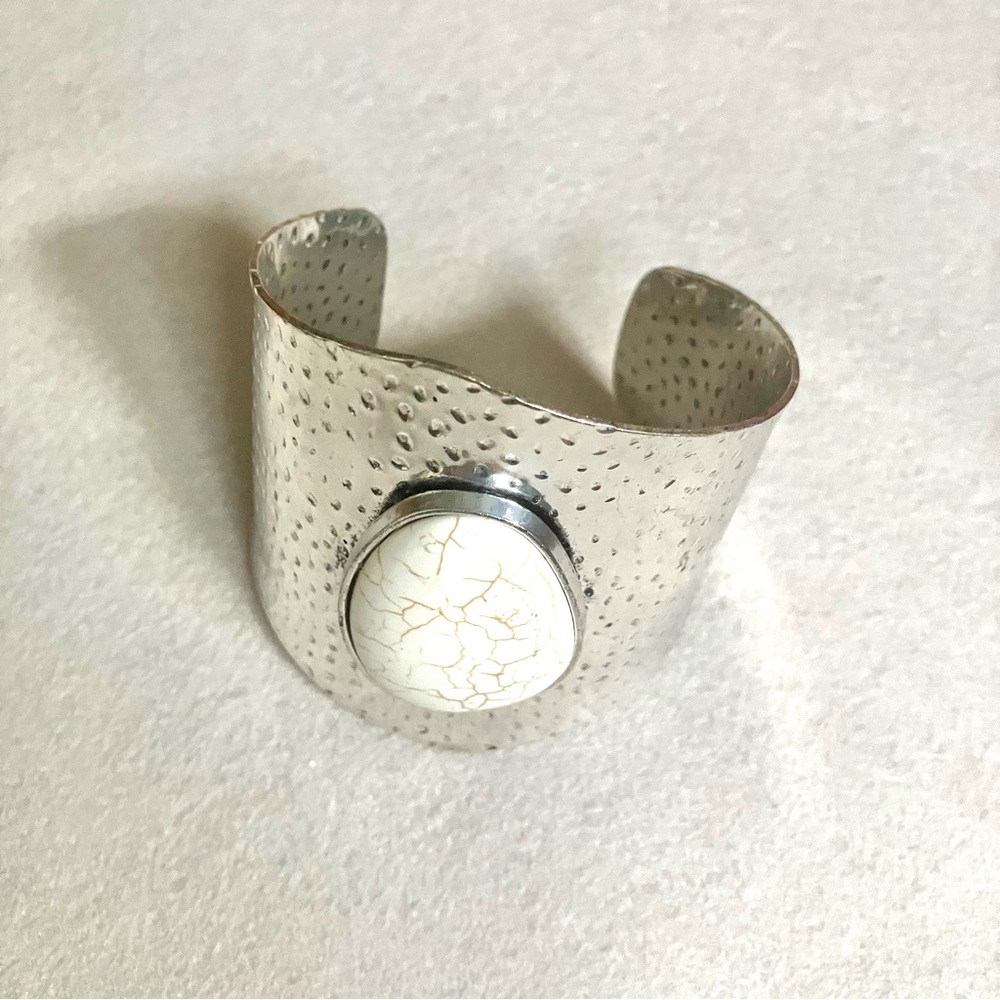 Wide silver cuff with white stone